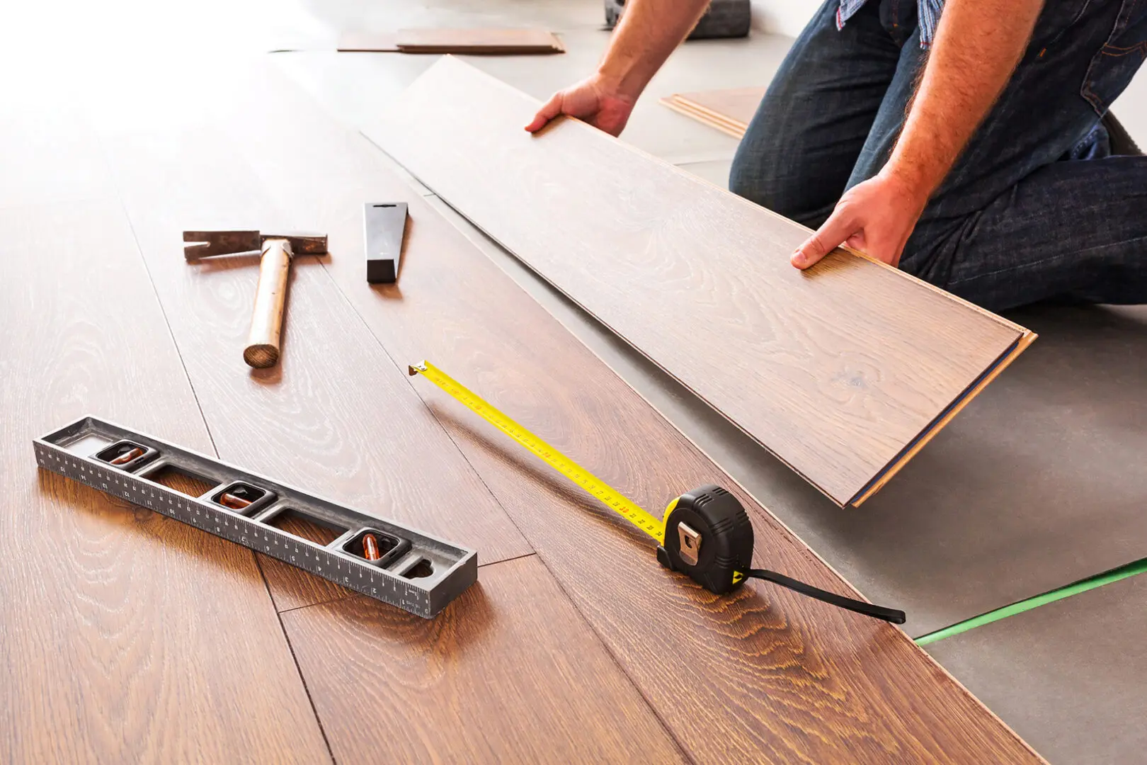 Man installing new laminated