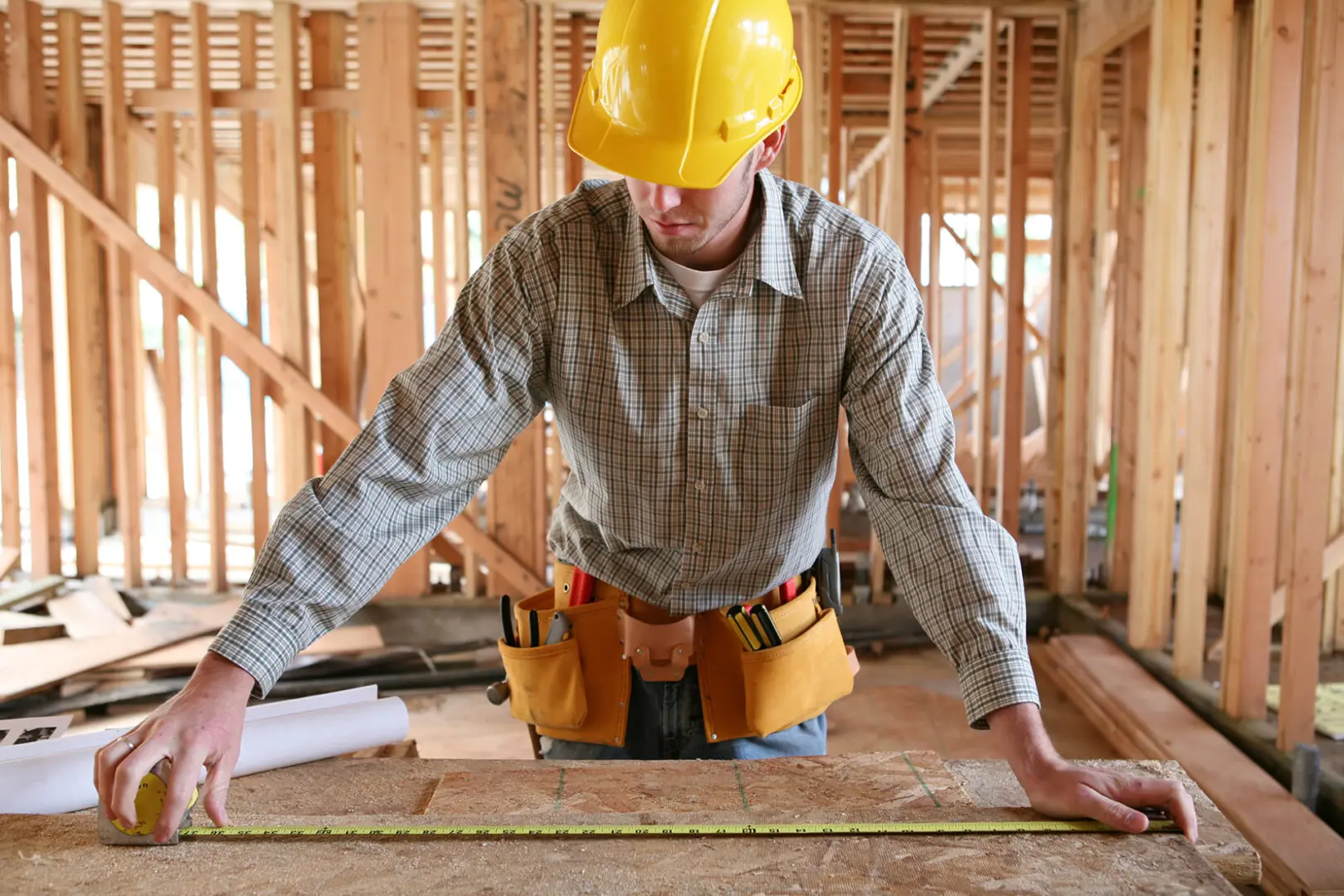 https://fcabuild.com/wp-content/uploads/2022/11/bigstock-Workman-Measuring-1371195.jpg